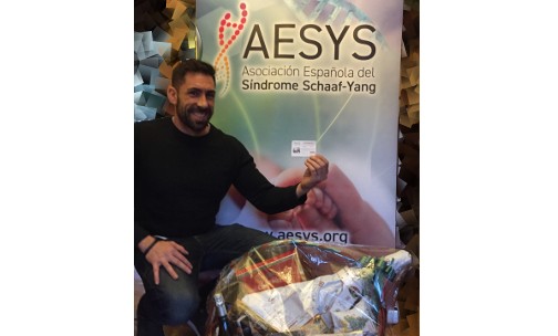 Entrega cesta Navidad sorteo en beneficio de AESYS